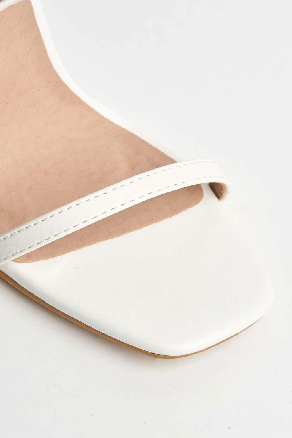 Lavz Ankle Strap Heels in White